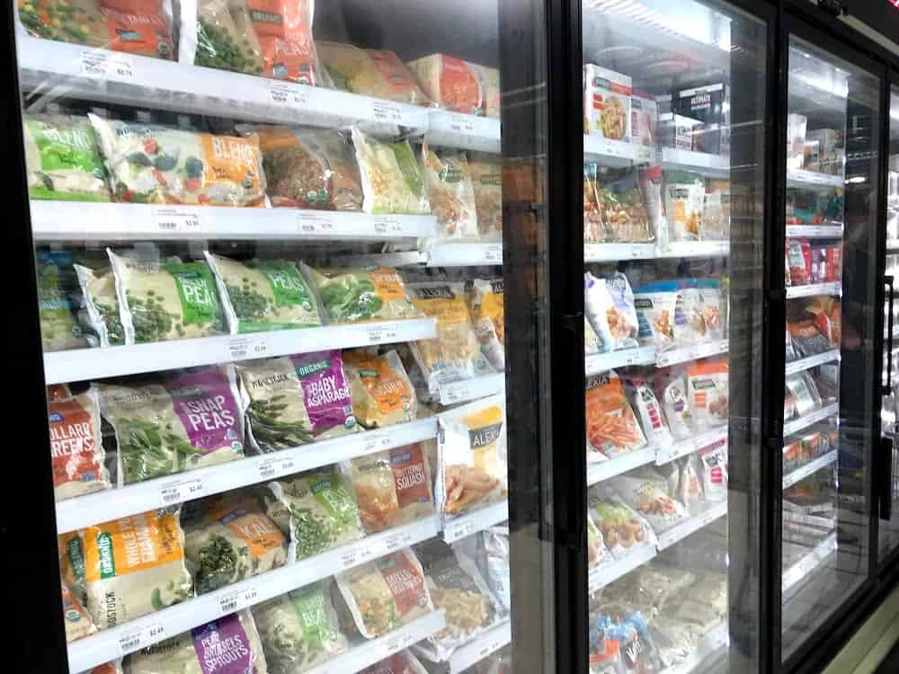 Grocery store short cuts, frozen Vegetables in grocery case